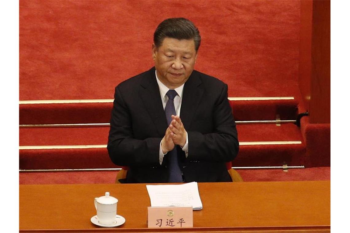 Chinas Präsident Xi Jinping bei der Eröffnungssitzung des Nationalen Volkskongresses in Peking. Foto: Andy Wong/Pool AP/dpa