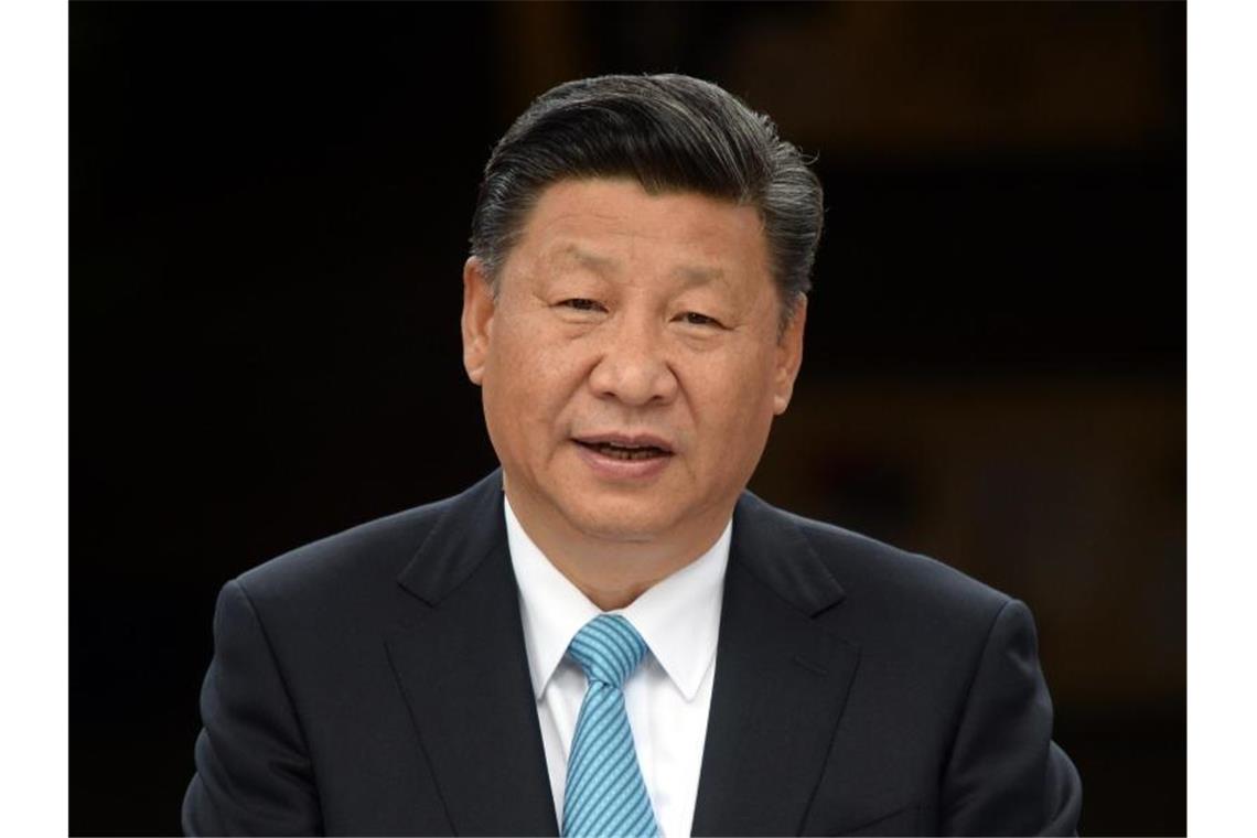 Chinas Präsident Xi Jinping zeigt sich zuversichtlich, dass der Kampf gegen das Virus bald geschafft sein könnte. Foto: Maurizio Gambarini/dpa