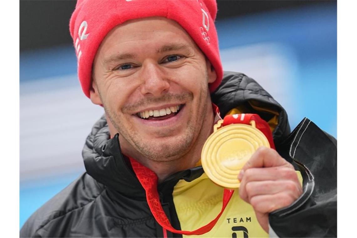 Skeletoni Grotheer setzt Gold-Festspiele im Eiskanal fort Christopher Grotheer raste als erster Deutscher zu Gold im Skeleton. Foto: Michael Kappeler/dpa