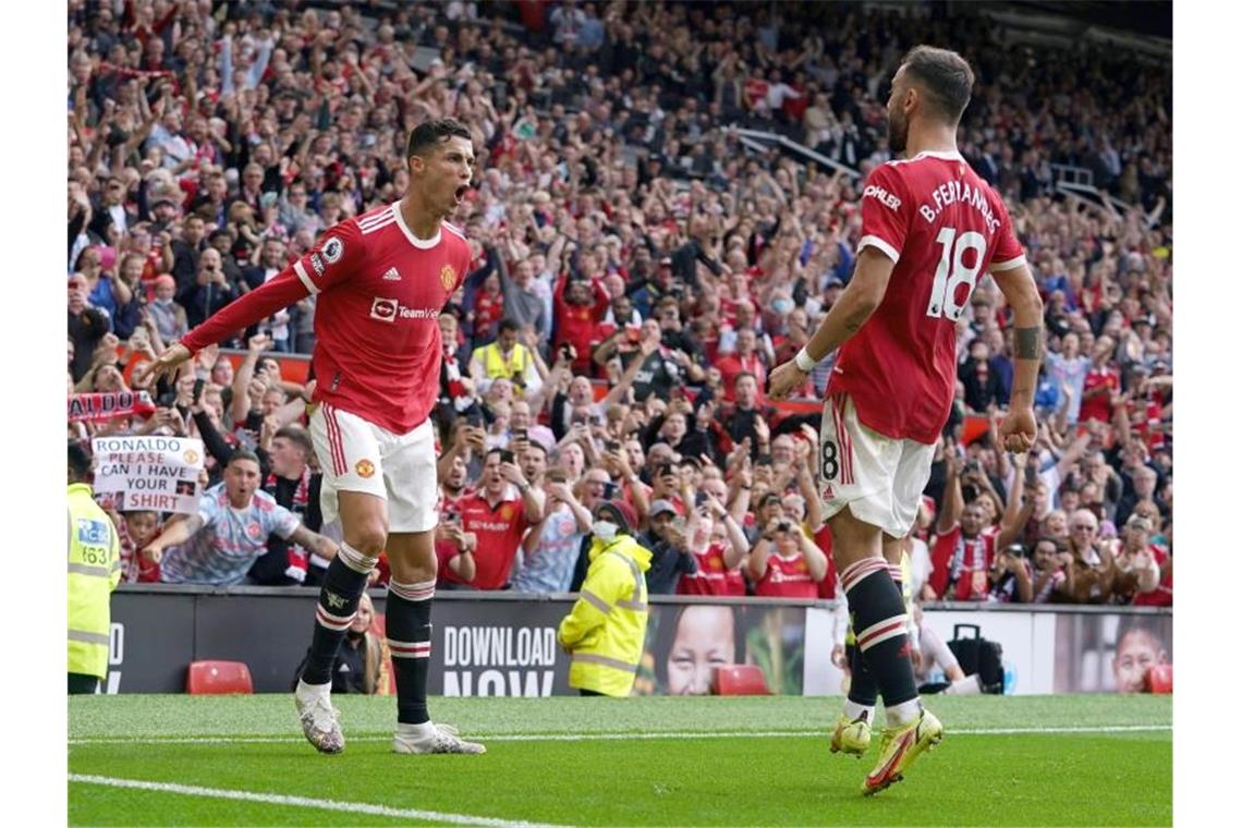 Ronaldo-Show bei United-Rückkehr: Superstar trifft doppelt Cristiano Ronaldo (l) schoss Manchester United bei seinem Comeback mit einem Doppelpack zum Sieg. Foto: Martin Rickett/PA Wire/dpa
