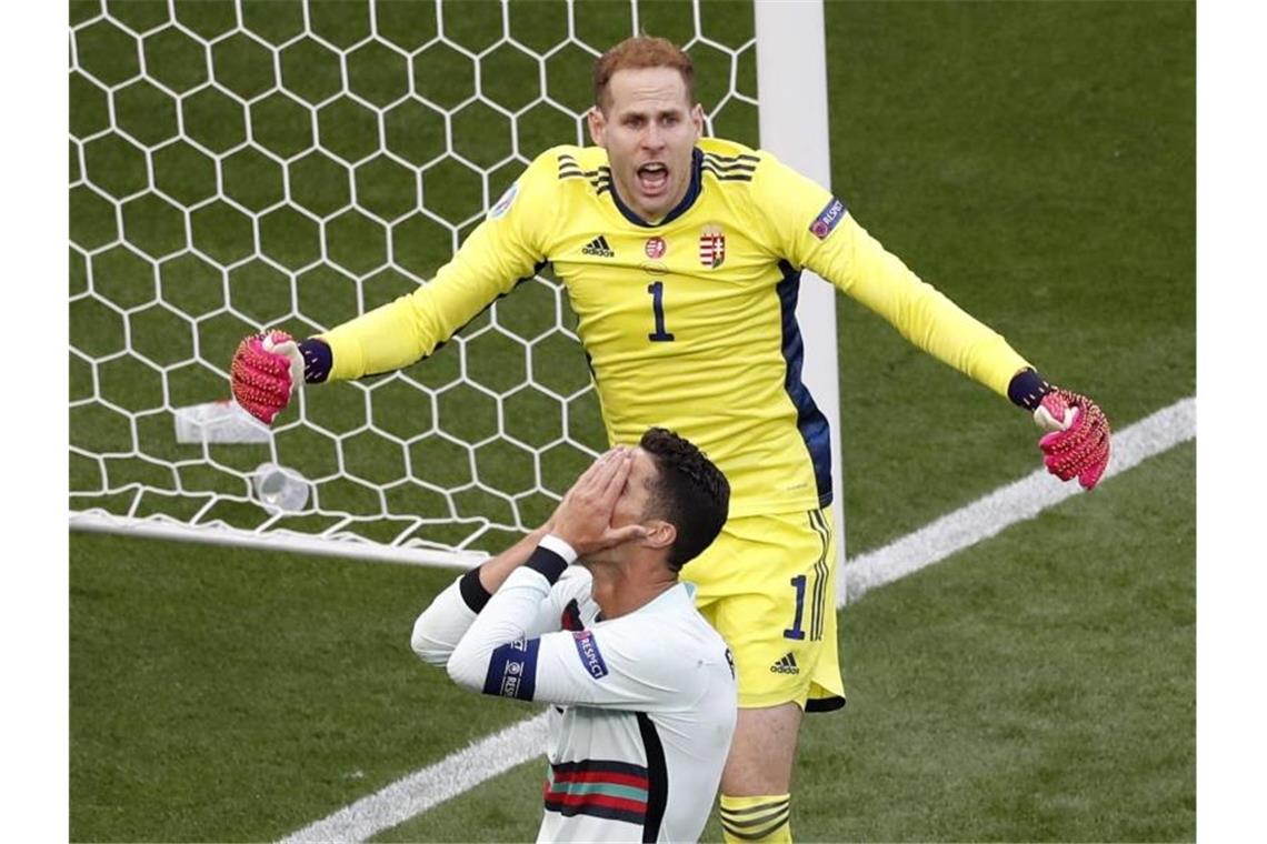 Portugal besiegt Ungarn mit einem „teuflischen Schlussakt“ Cristiano Ronaldo (v.) ärgert sich nach einer vergebenen Großchance. Foto: /Laszlo Balogh/AP-Pool/dpa