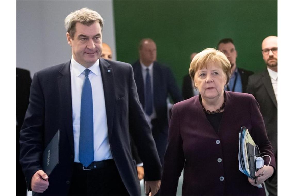 CSU-Chef Markus Söder (r.) und Bundeskanzlerin Angela Merkel. Foto: Bernd von Jutrczenka/dpa