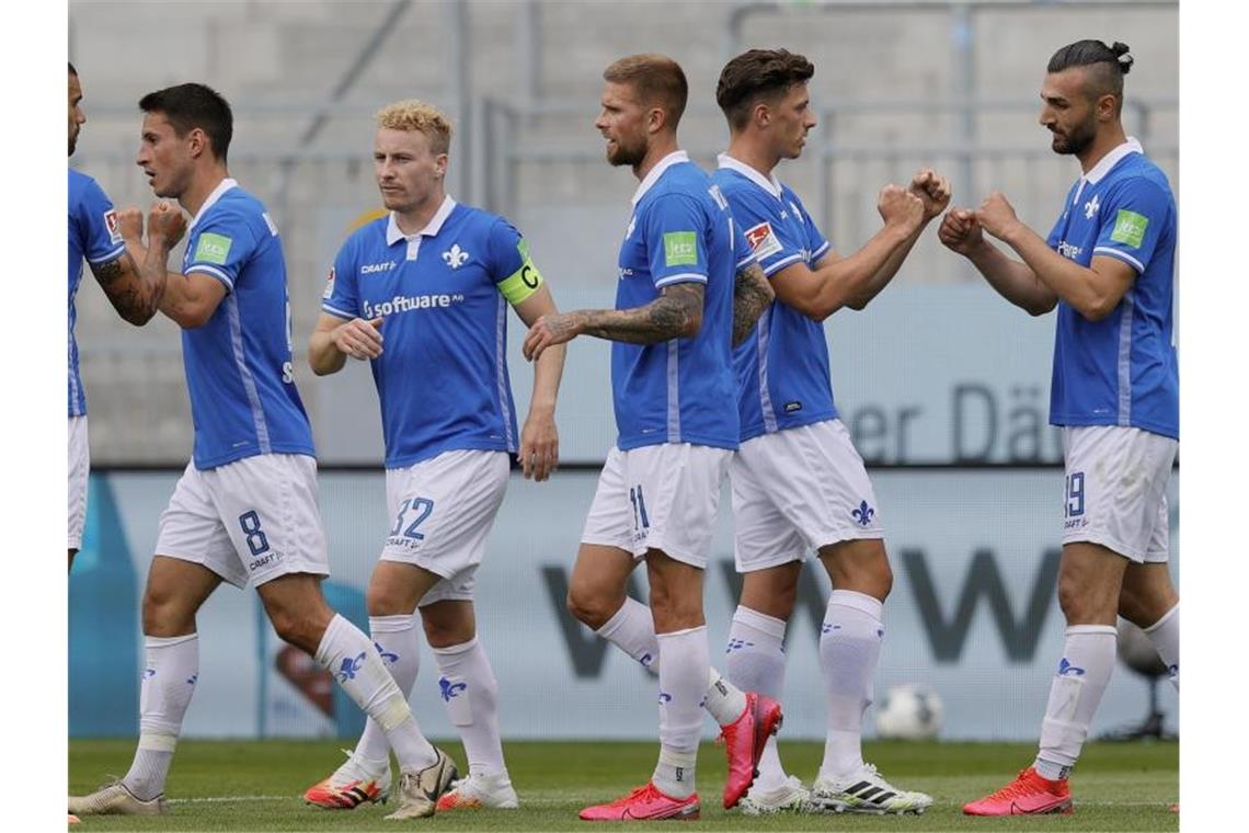 Darmstadt 98 feierte gegen Hannover 96 einen Last-Minute-Sieg. Foto: Ronald Wittek/epa Pool/dpa