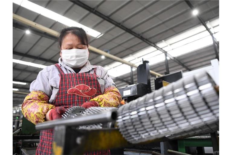 Das Coronavirus hat für China schwere wirtschaftliche Folgen. Foto: Tang Yi/XinHua/dpa