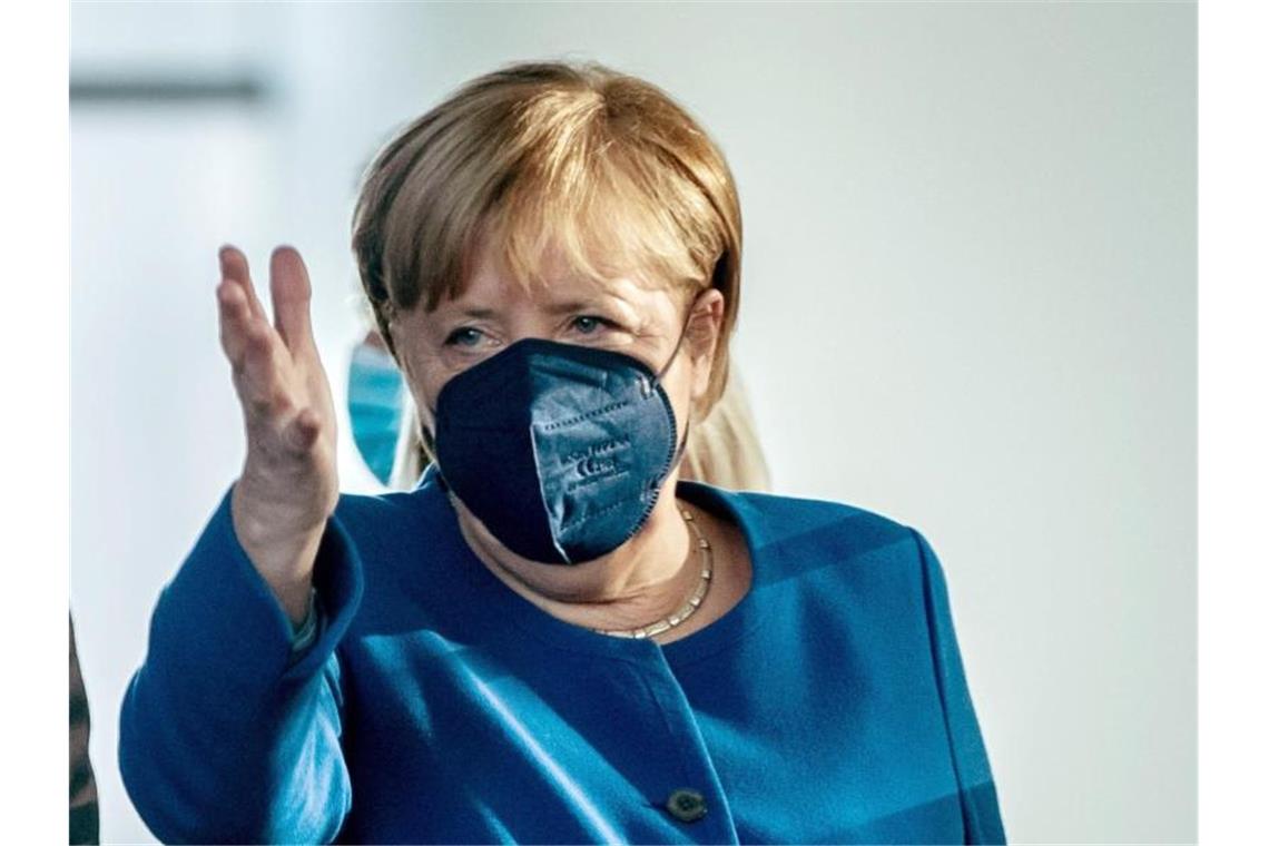 Corona-Lage immer kritischer - Merkel: „Rasch Handeln“ „Das Coronavirus nimmt keine Rücksicht darauf, ob wir gerade eine geschäftsführende Regierung haben, ob wir gerade Koalitionsverhandlungen haben“: Angela Merkel. Foto: Kay Nietfeld/dpa
