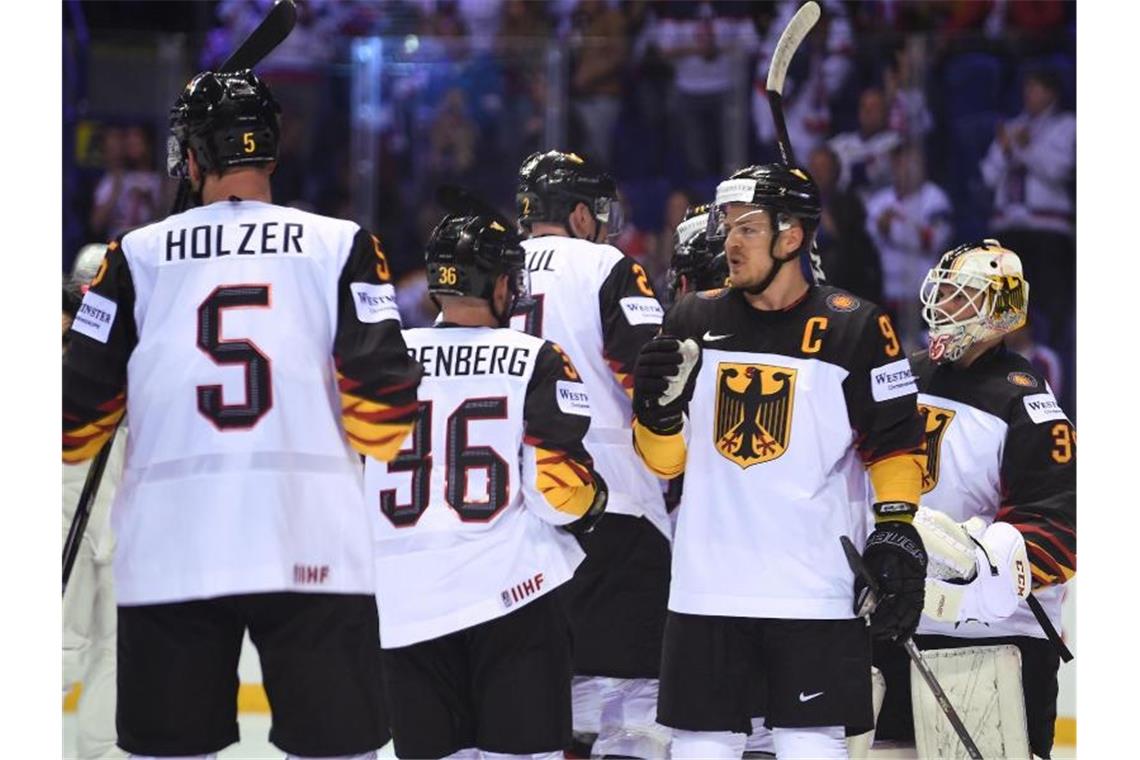 Eishockey-Team auch gegen Dänen unter Druck Das DEB-Team will auch gegen Dänemark gewinnen. Foto: Monika Skolimowska