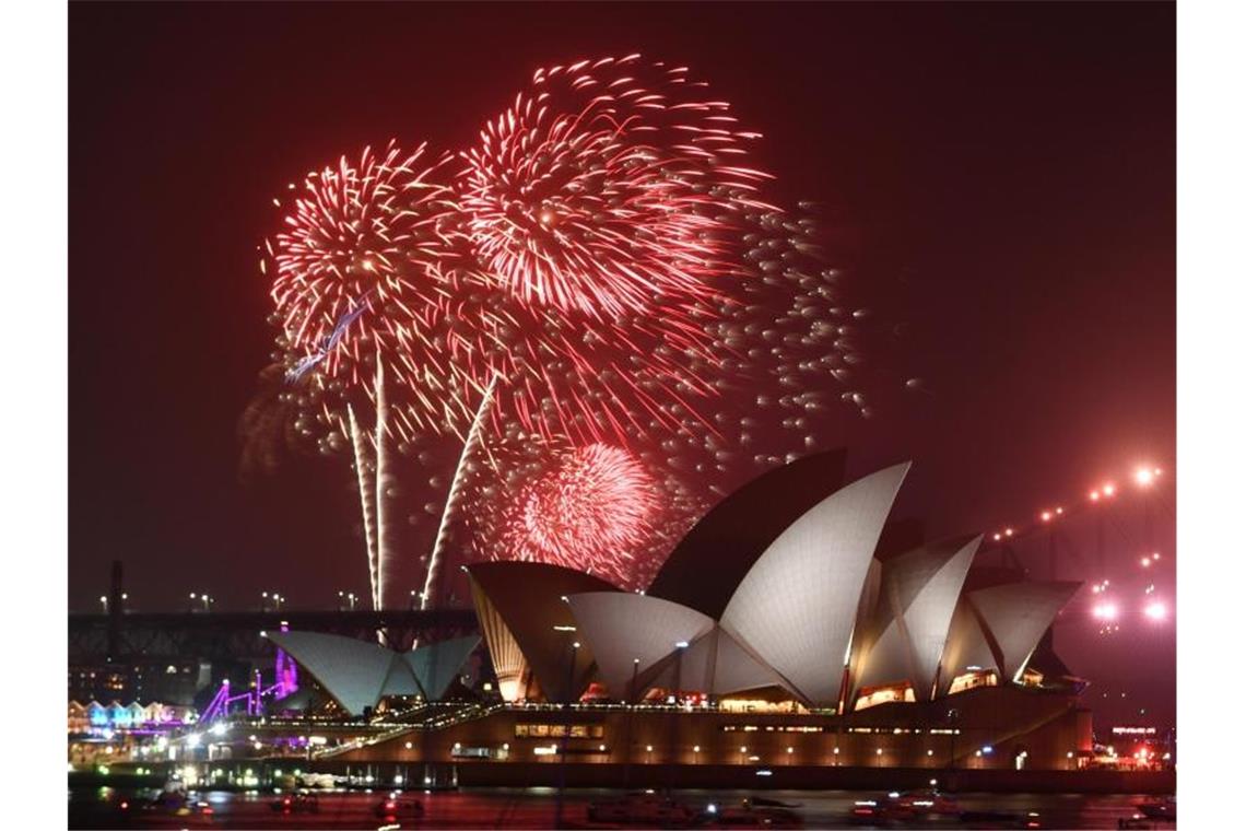 2020 ist da: Ausgelassene Silvesterpartys weltweit Das Familien-Feuerwerk in Sydney. Foto: City Of Sydney - Mick Tsikas/AAP/dpa