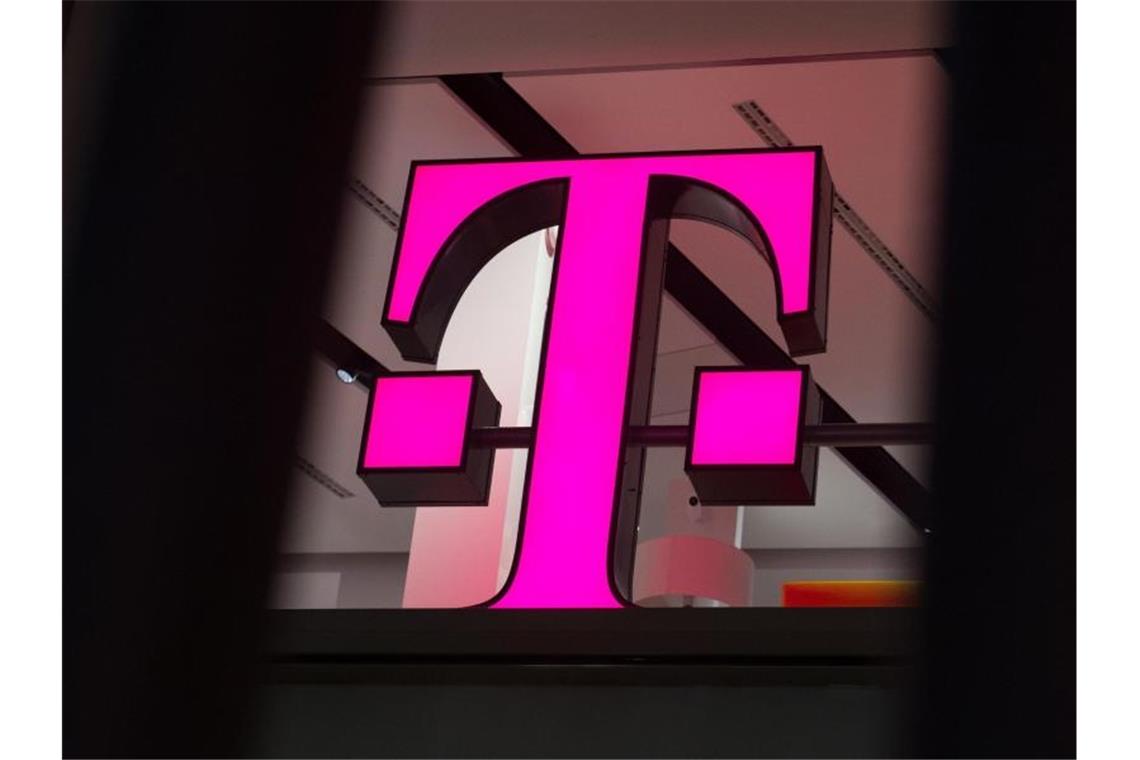 Das Logo der Deutschen Telekom. Foto: Rainer Jensen/dpa/Archivbild