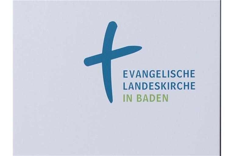 Das Logo der evangelischen Landeskirche in Baden. Foto: picture alliance /dpa/Archivbild