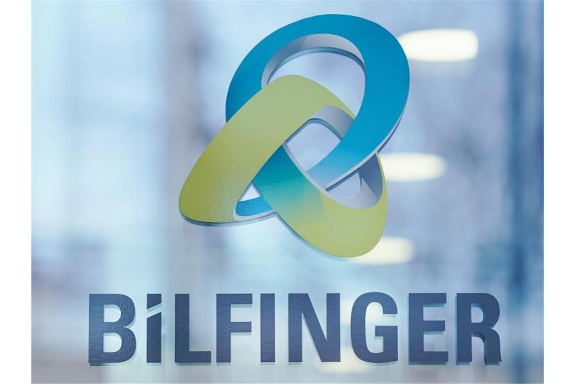 Bilfinger: Schadenersatz gegen Ex-Vorstände durchsetzen Das Logo des Industriedienstleisters Bilfinger ist am Hauptsitz des Unternehmens angebracht. Foto: Uwe Anspach/dpa/Archivbild