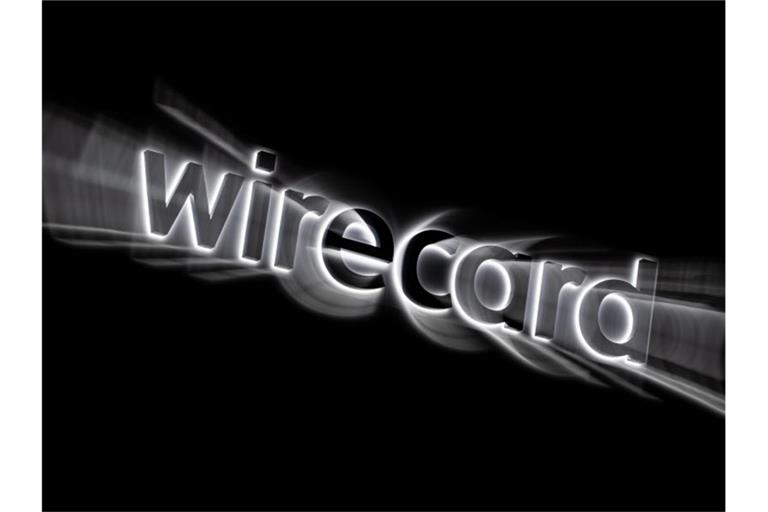 Das Logo von Wirecard an der Fassade des Firmensitzes in Aschheim bei München. Foto: Peter Kneffel/dpa