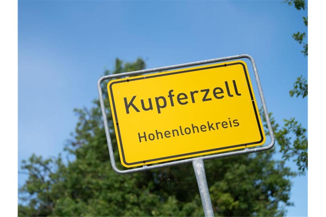 Das Ortsschild der Gemeinde Kupferzell. Foto: Marijan Murat/dpa/Archivbild