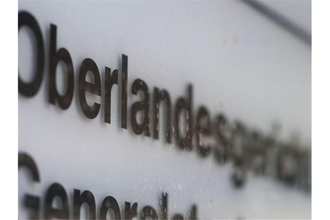 Arbeitstempo eines Richters wird erneut verhandelt Das Wort "Oberlandesgericht" ist auf einem Schild zu lesen. Foto: Marijan Murat/Archivbild