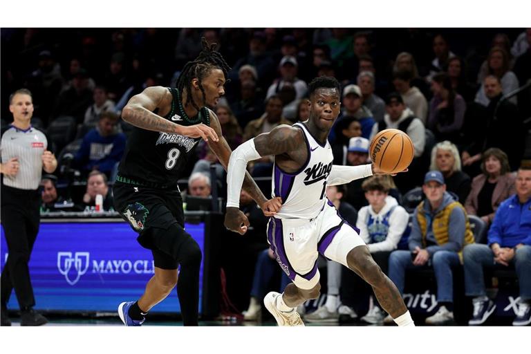 Dennis Schröder (r) erzielte 17 Punkte für die Kings, zum Sieg in Minnesota reichte es aber nicht.