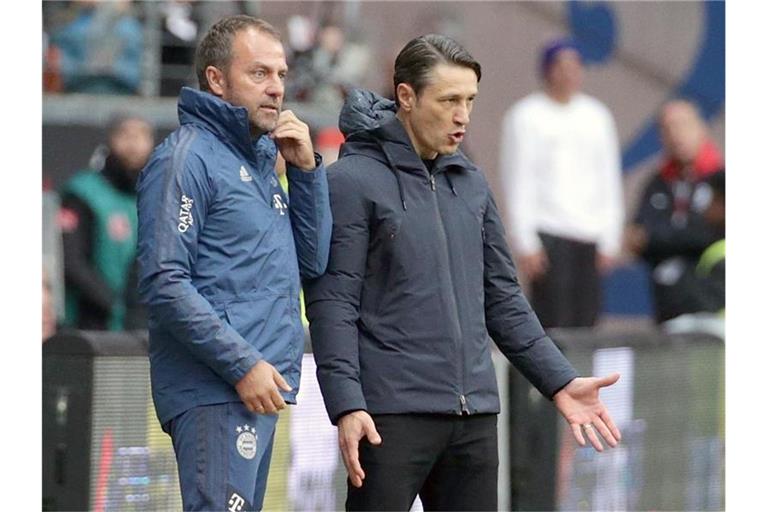 Der bisherige Co-Trainer Hans-Dieter „Hansi“ Flick (l) übernimmt zunächst das Traineramt vom bisherigen Cheftrainer Niko Kovac. Foto: Hasan Bratic/dpa