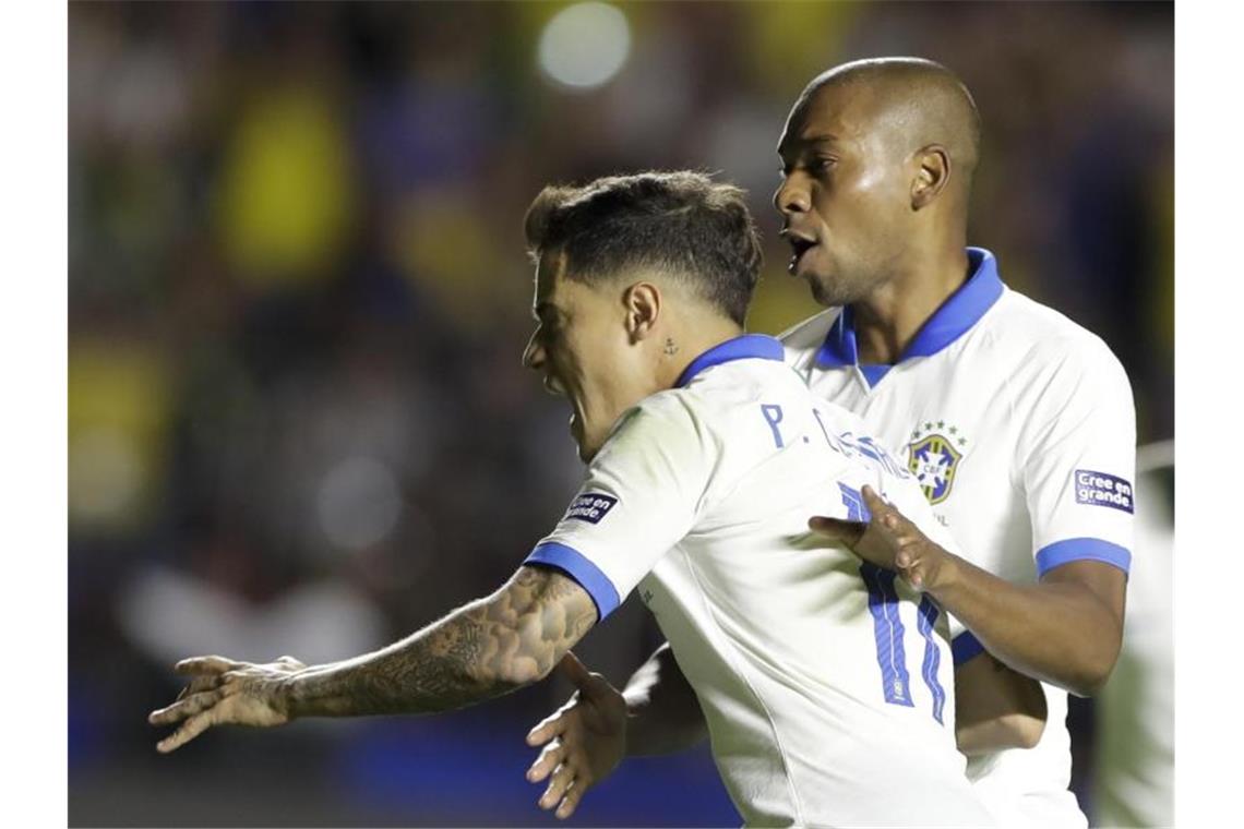 Der Brasilianer Philippe Coutinho (l) erzielte zwei Treffer für sein Team. Foto: Andre Penner/AP