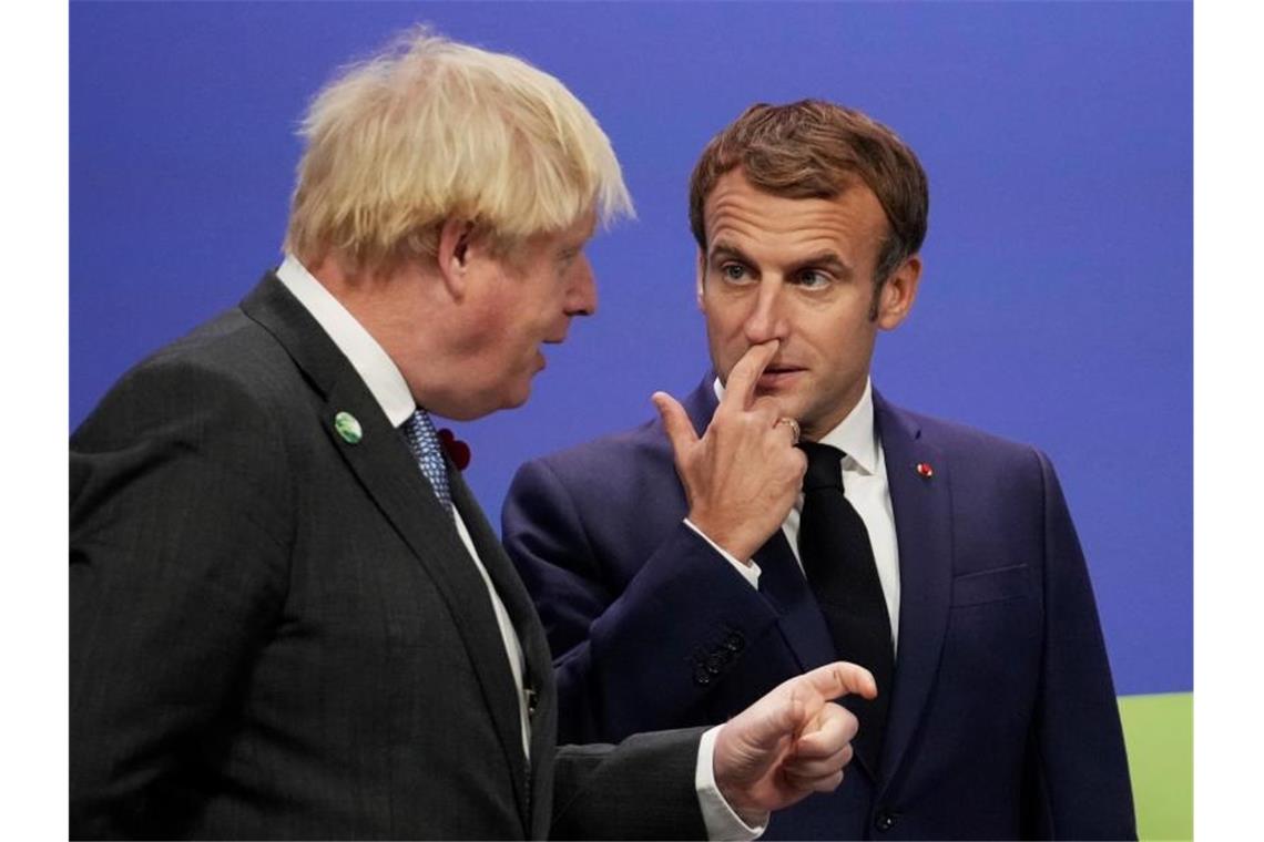 Der britische Premierminister Boris Johnson (l.) Frankreichs Präsidenten Emmanuel Macron. Foto: Christopher Furlong/Getty/AP/dpa/Archiv