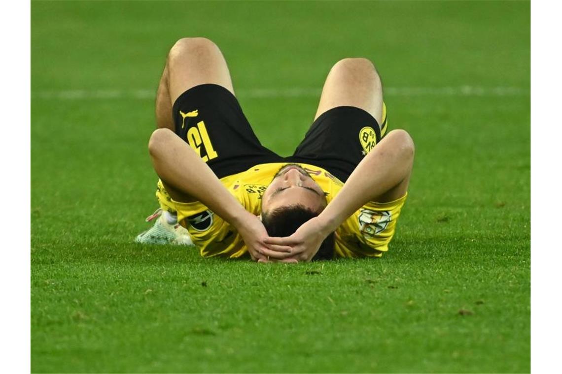 BVB hofft auf Rückkehr in europäischen Fußball-Adel Der BVB muss wohl weiter auf Raphael Guerreiro verzichten. Foto: Federico Gambarini/dpa-Pool/dpa
