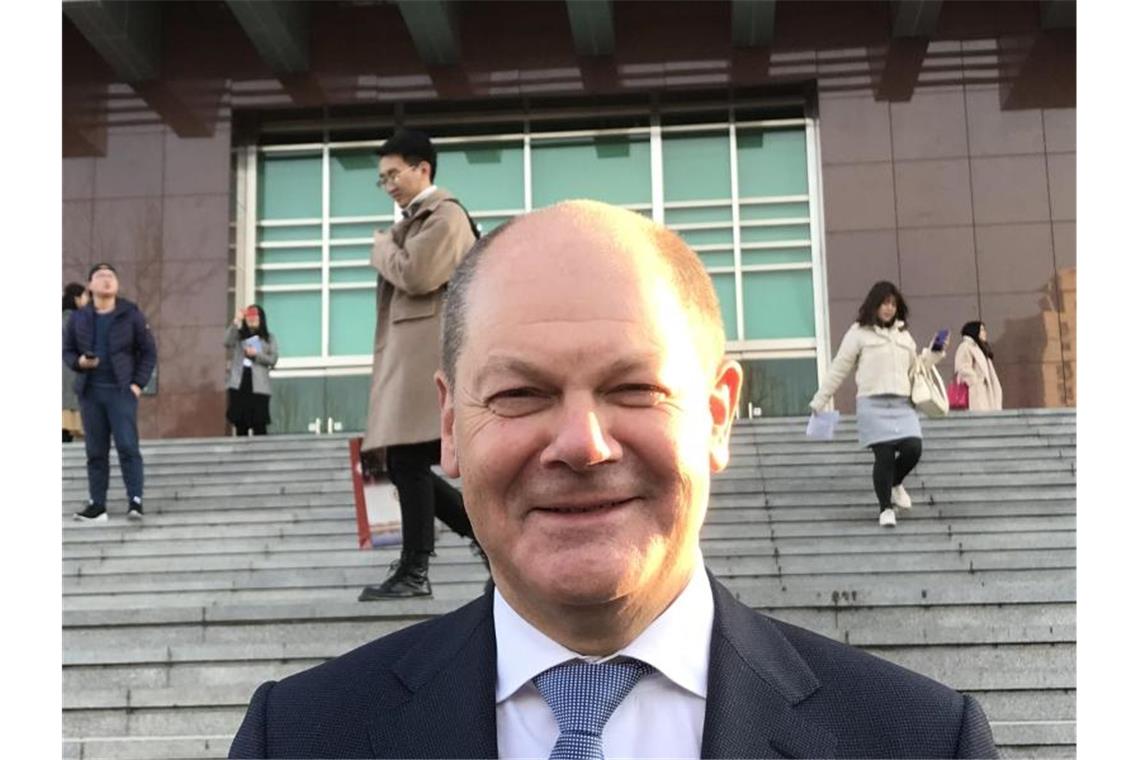 So reagiert das Ausland auf die Wahl von Scholz Der damalige Bundesfinanzminister Olaf Scholz in Peking. Foto: Georg Ismar/dpa/Archiv