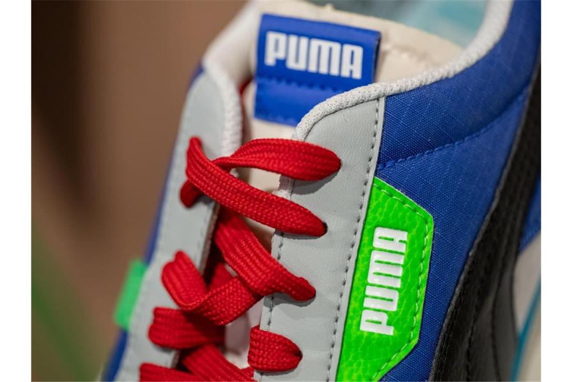 Politische Spannungen gefährden Pumas Rekordlauf Der Dax-Neuling Puma hat seine Zahlen für das abgelaufene Geschäftsjahr bekanntgegeben. Foto: Daniel Karmann/dpa