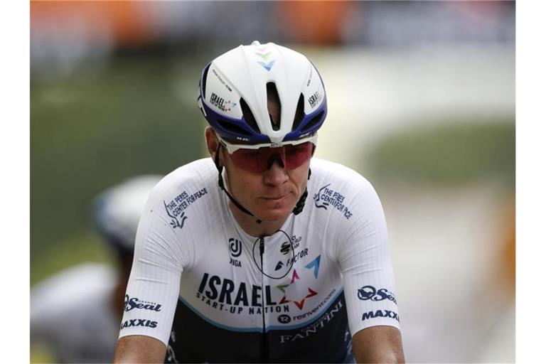 Der ehemalige Tour-Sieger Chris Froome ist nun Wasserträger. Foto: Benoit Tessier/Reuters/dpa