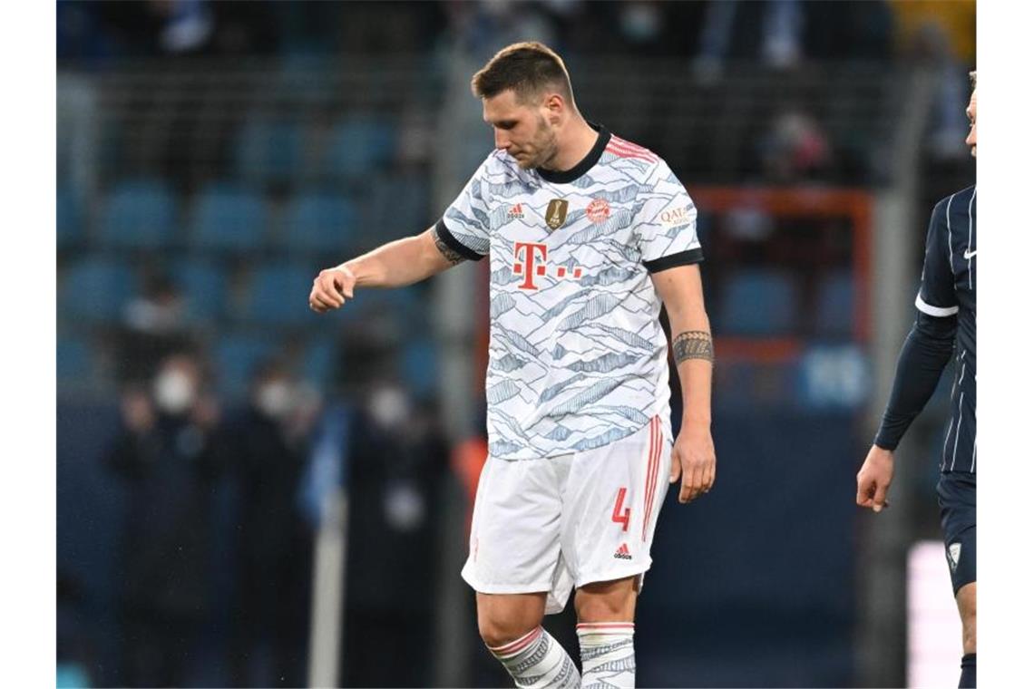 Bayern-Blamage - Große Abstiegsgefahr bei Hertha und VfB Der FC Bayern München um Niklas Süle (l) blamierte sich in Bochum. Foto: Bernd Thissen/dpa