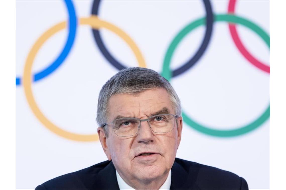 Der internationale Druck auf IOC-Chef Thomas Bach wird immer größer. Foto: Jean-Christophe Bott/KEYSTONE/dpa