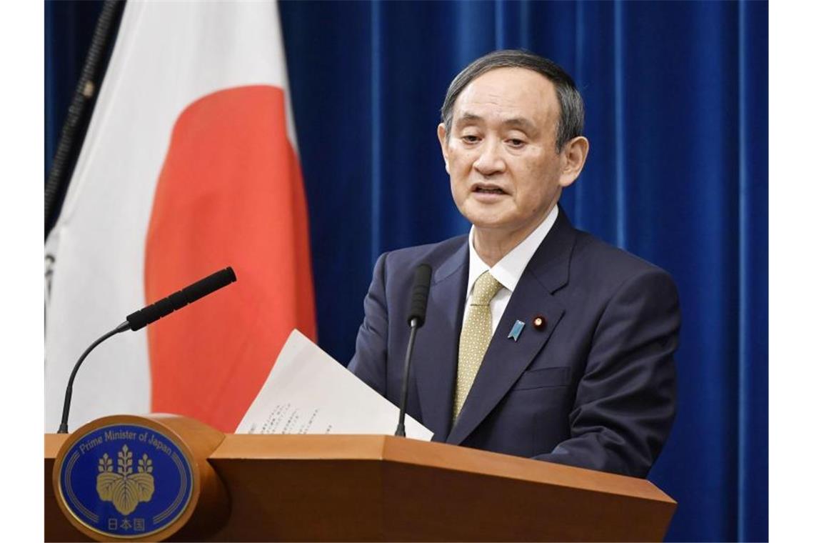 Japans Regierungschef hält an Olympia-Planung unbeirrt fest Der japanische Ministerpräsident Yoshihide Suga hält weiter an der Olympia-Planung fest. Foto: -/kyodo/dpa