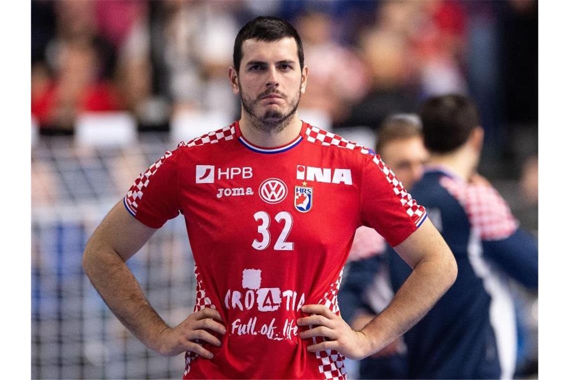 Der kroatische Handballer Ivan Sliskovic reagiert während des Spiels. Foto: Marius Becker/dpa/Archivbild