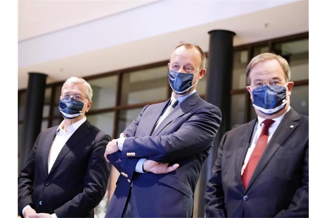 Zweifel an Präsenzformat für den CDU-Parteitag nehmen zu Der neue CDU-Vorstizende - hier die drei Kandidaten Norbert Röttgen, Friedrich Merz und Armin Laschet - soll am 4. Dezember Stuttgart gewählt werden. Foto: Michael Kappeler/dpa-pool/dpa