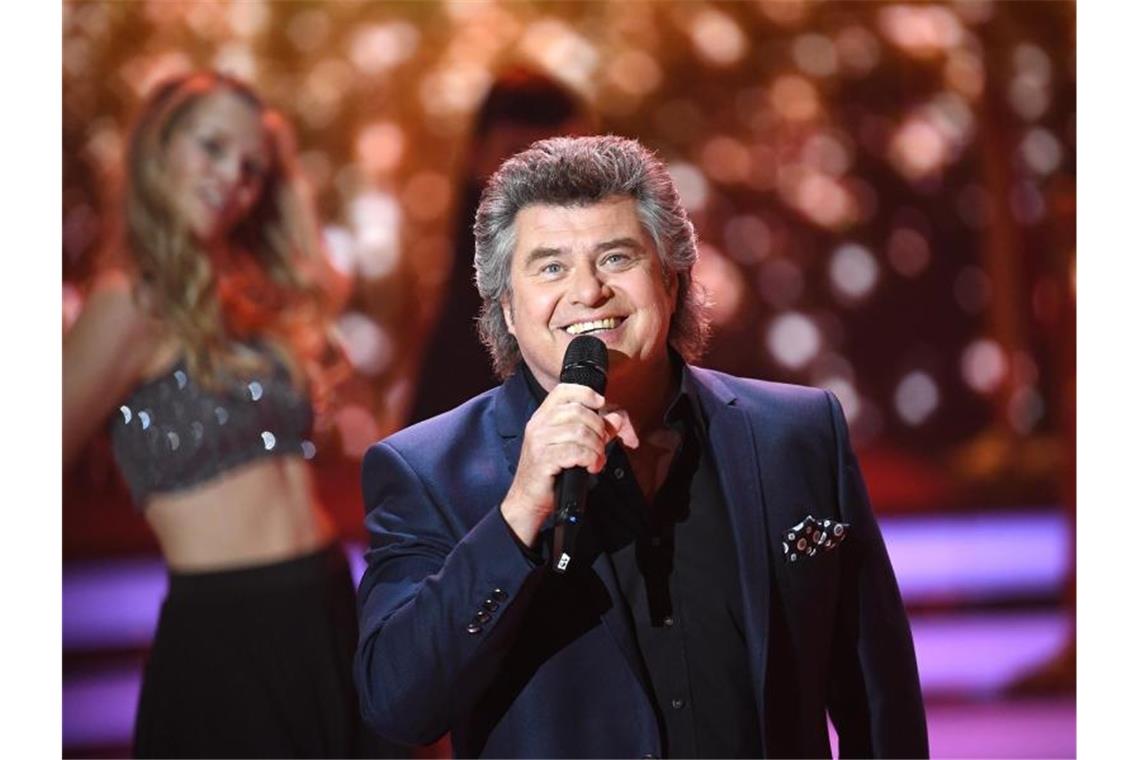 Der Sänger Andy Borg singt bei der ZDF-Show „Willkommen bei Carmen Nebel“. Foto: Britta Pedersen/Archivbild