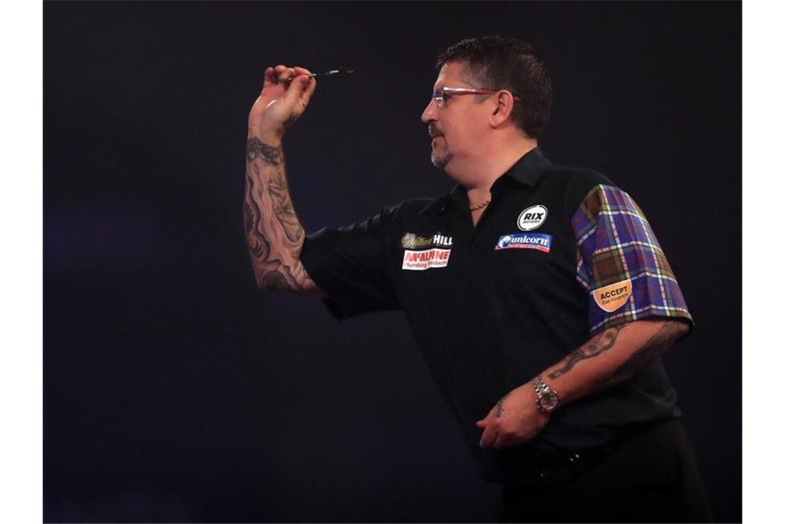 Der schottische Darts-Spieler Gary Anderson in Aktion. Foto: Adam Davy/PA Wire/dpa/Archiv