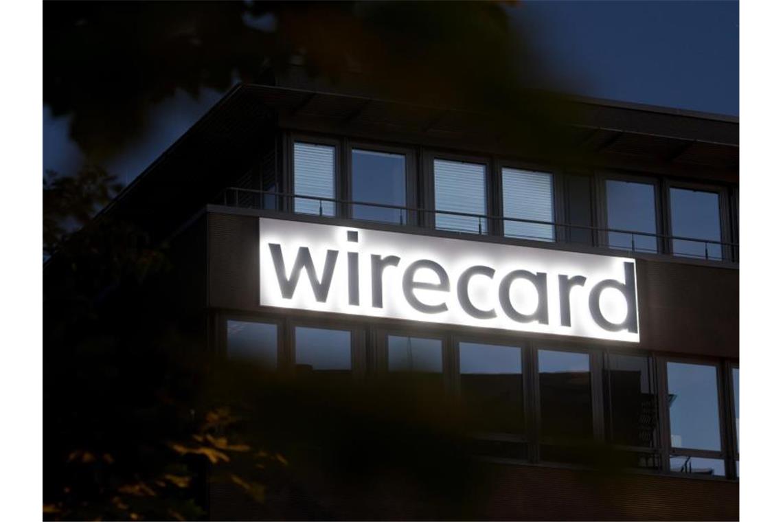Der Schriftzug von Wirecard an der Firmenzentrale des Zahlungsdienstleisters. Foto: Tobias Hase/dpa