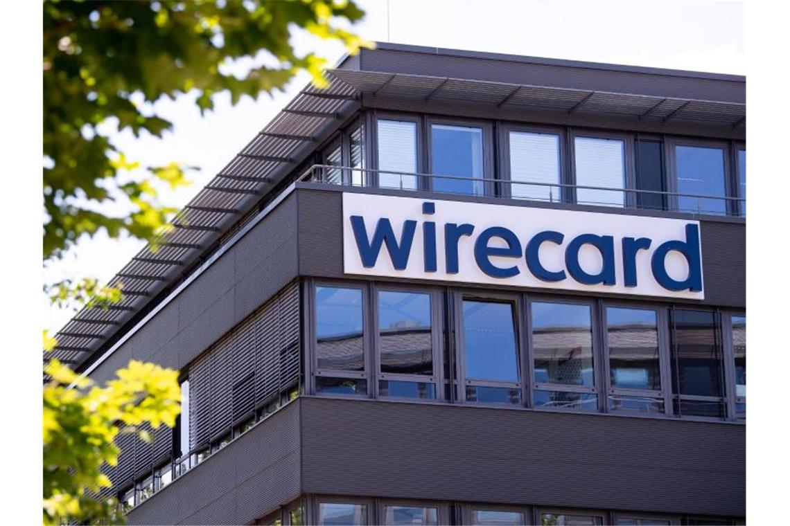 Der Schriftzug von Wirecard ist an der Firmenzentrale zu sehen. Foto: Sven Hoppe/dpa/Symbolbild