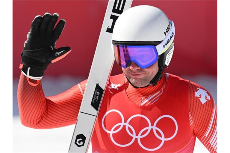 Der Schweizer Beat Feuz jubelt im Ziel. Foto: Robert Michael/dpa-Zentralbild/dpa