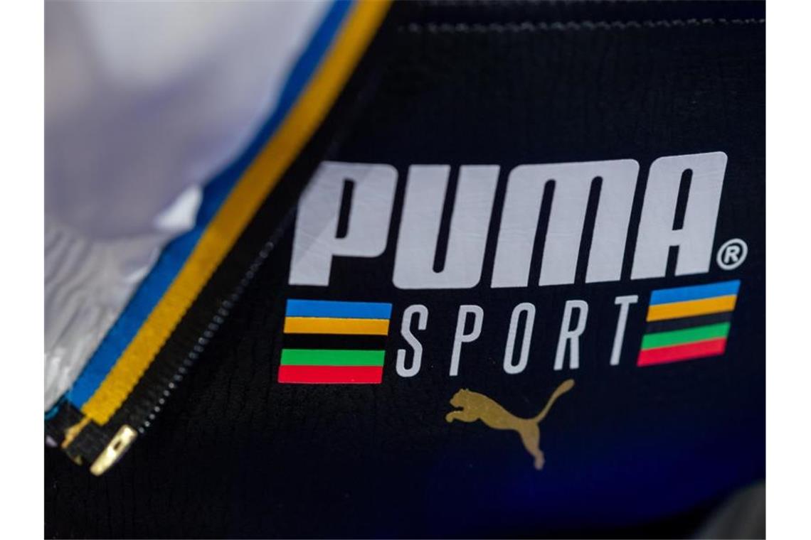 Der Sportartikelhersteller Puma will wegen der Coronavirus-Pandemie die Dividende aussetzen. Foto: Daniel Karmann/dpa