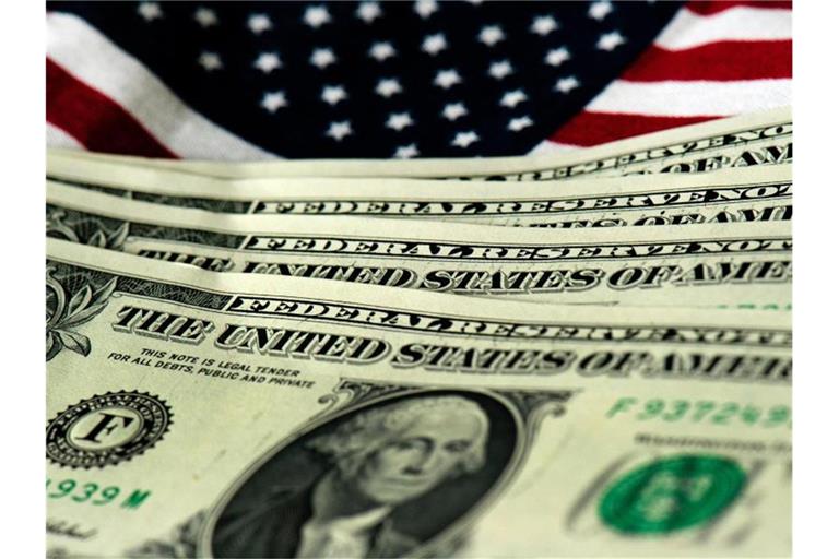 Der US-Finanzgigant PGMorgan zieht eine positive Bilanz. Foto: Arno Burgi/dpa-Zentralbild/dpa