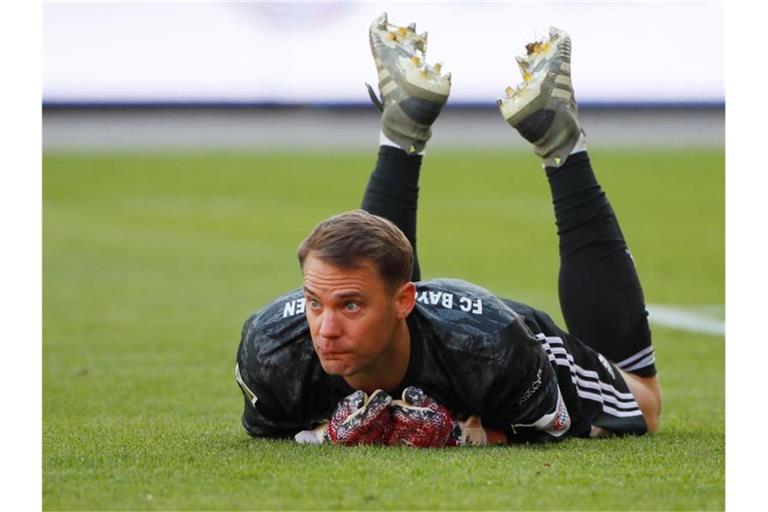 Der Vertragspoker mit Manuel Neuer bleibt spannend. Foto: Hannibal Hanschke/Reuters-Pool/dpa