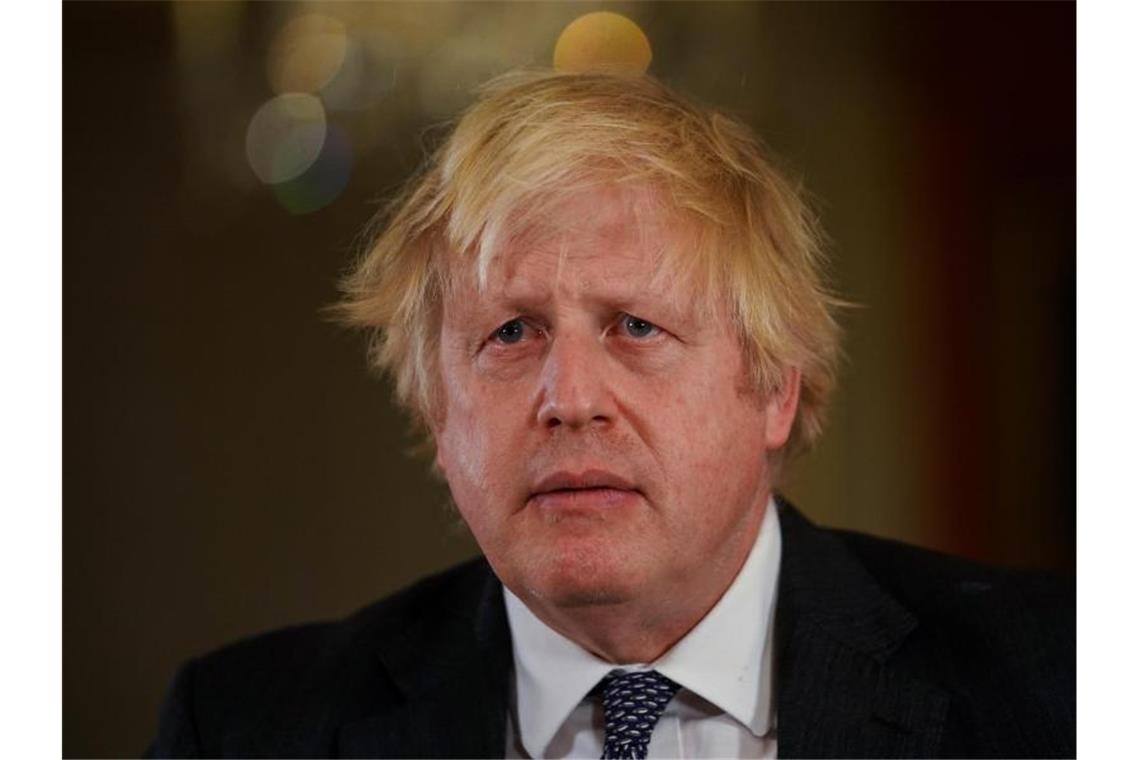 Beschuss von allen Seiten: Kann sich Boris Johnson halten? Derzeit halten Corona und die erfolgreiche britische Impfkampagne den Premier Boris Johnson im Amt. Foto: Kirsty O'connor/PA/dpa