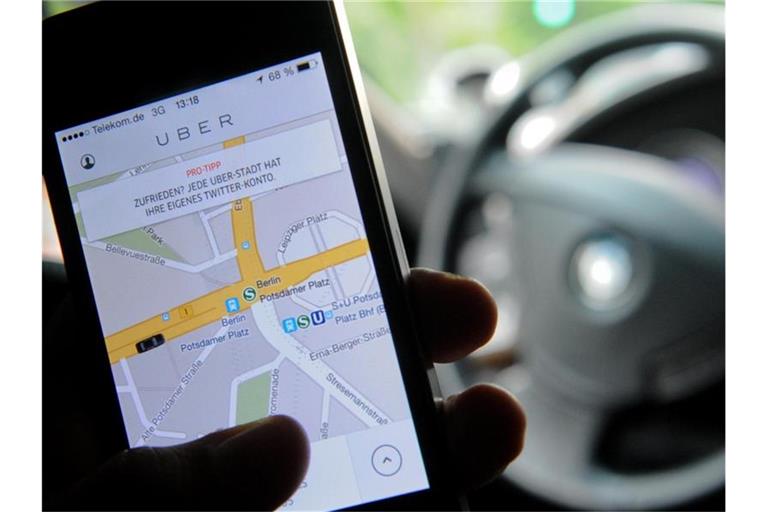 Die App des Fahrdienstvermittlers Uber. Foto: Britta Pedersen/zb/dpa
