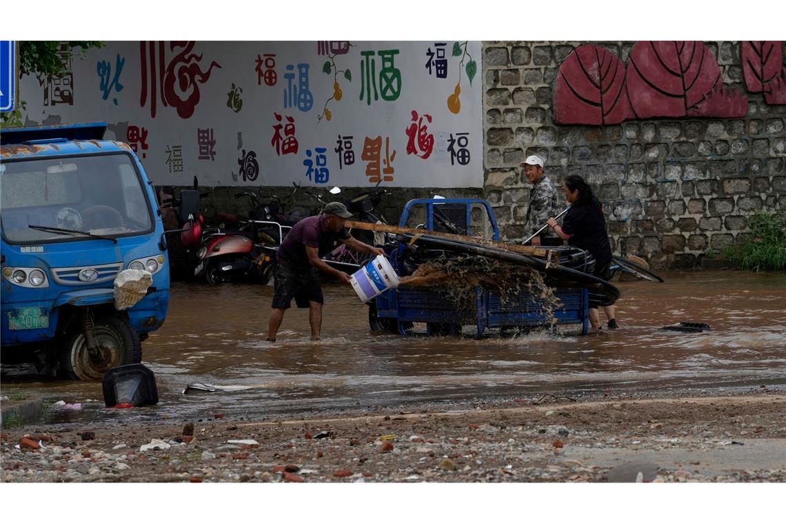 Mindestens 38 Tote bei schweren Regenfällen um Peking Die Behörden hatten vor schweren Unwettern gewarnt.
