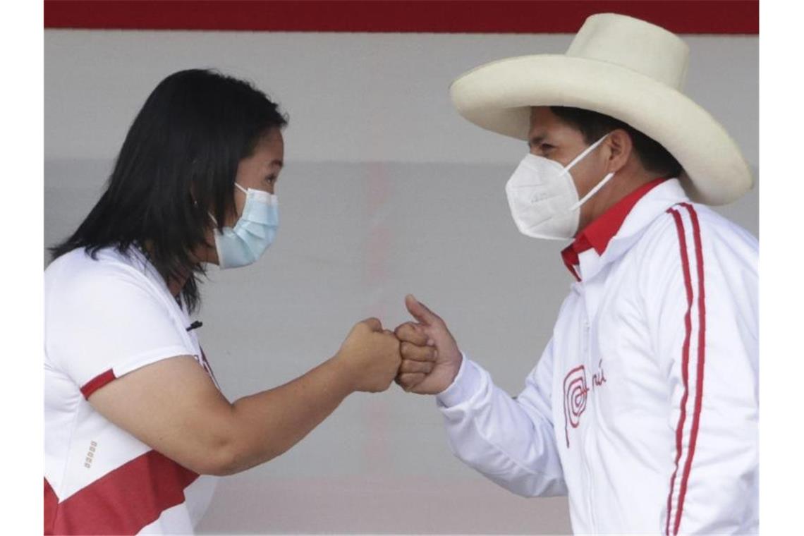Die beiden Präsidentschaftskandidaten Keiko Fujimori (l) und Pedro Castillo. Foto: Francisco Vigo/AP/dpa
