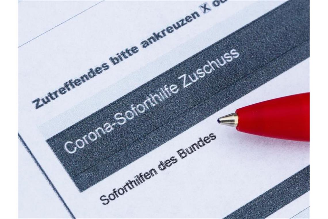 Zehntausendfach Verdacht auf Betrug mit Corona-Hilfen Die Corona-Soforthilfe war dazu gedacht, in der Corona-Krise die wirtschaftliche Existenz der Firmen und Selbstständigen zu sichern. Foto: Robert Michael/dpa-Zentralbild/dpa