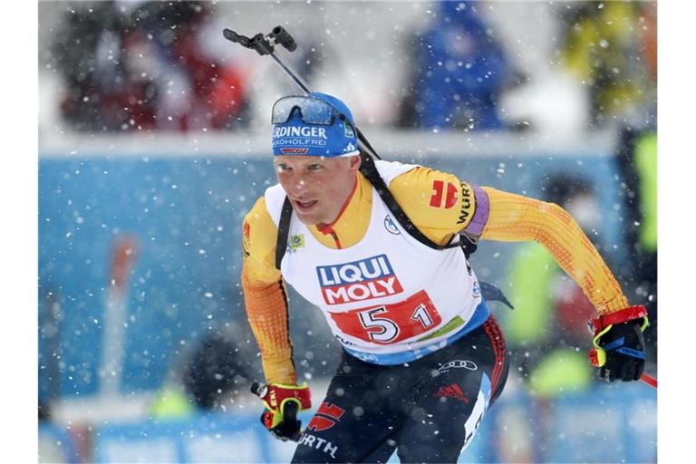 Die deutsche Biathlon-Mixed-Staffel um Erik Lesser kam nur auf Rang sieben. Foto: Darko Bandic/AP/dpa