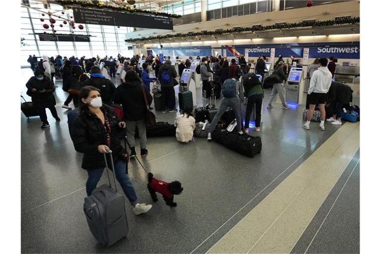 Die deutsche Bundesregierung stuft die USA vom 25.12.21 an als Hochrisikogebiet ein. Foto: Charles Rex Arbogast/AP/dpa