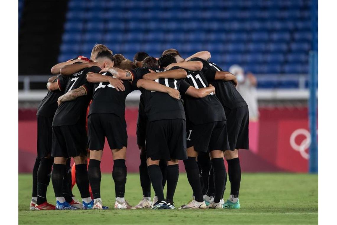 Motivation Eröffnungsfeier: DFB-Team braucht Pflichtsieg Die deutsche Mannschaft steht unter Druck. Foto: Swen Pförtner/dpa