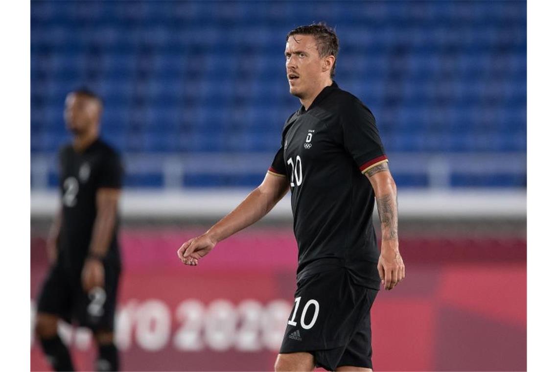 DFB-Team glaubt weiter an Medaille - Nun ein „Endspiel“ Die deutschen Fußballer um Max Kruse müssen sich deutlich steigern. Foto: Swen Pförtner/dpa