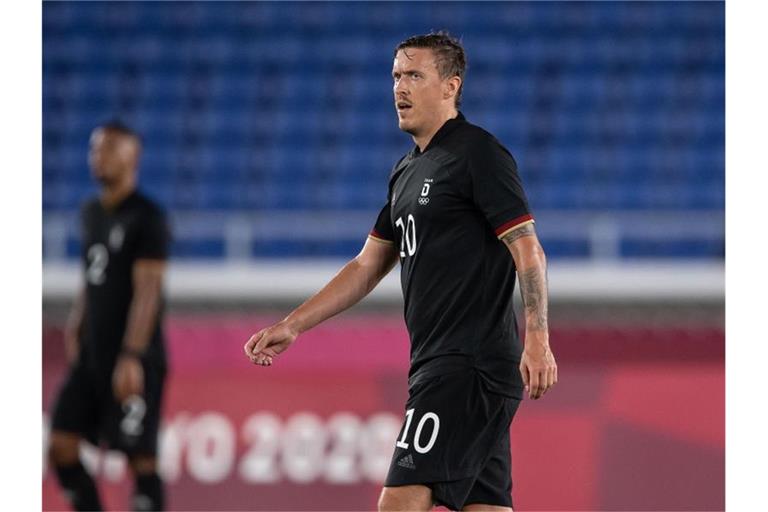 Die deutschen Fußballer um Max Kruse müssen sich deutlich steigern. Foto: Swen Pförtner/dpa