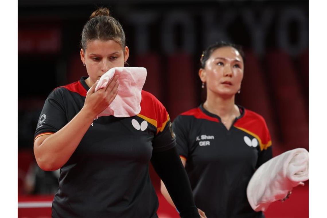 Das war die Olympia-Nacht: Gold für Wellbrock Die deutschen Tischtennisspielerinnen haben das kleine Finale gegen Hongkong verloren. Foto: Friso Gentsch/dpa