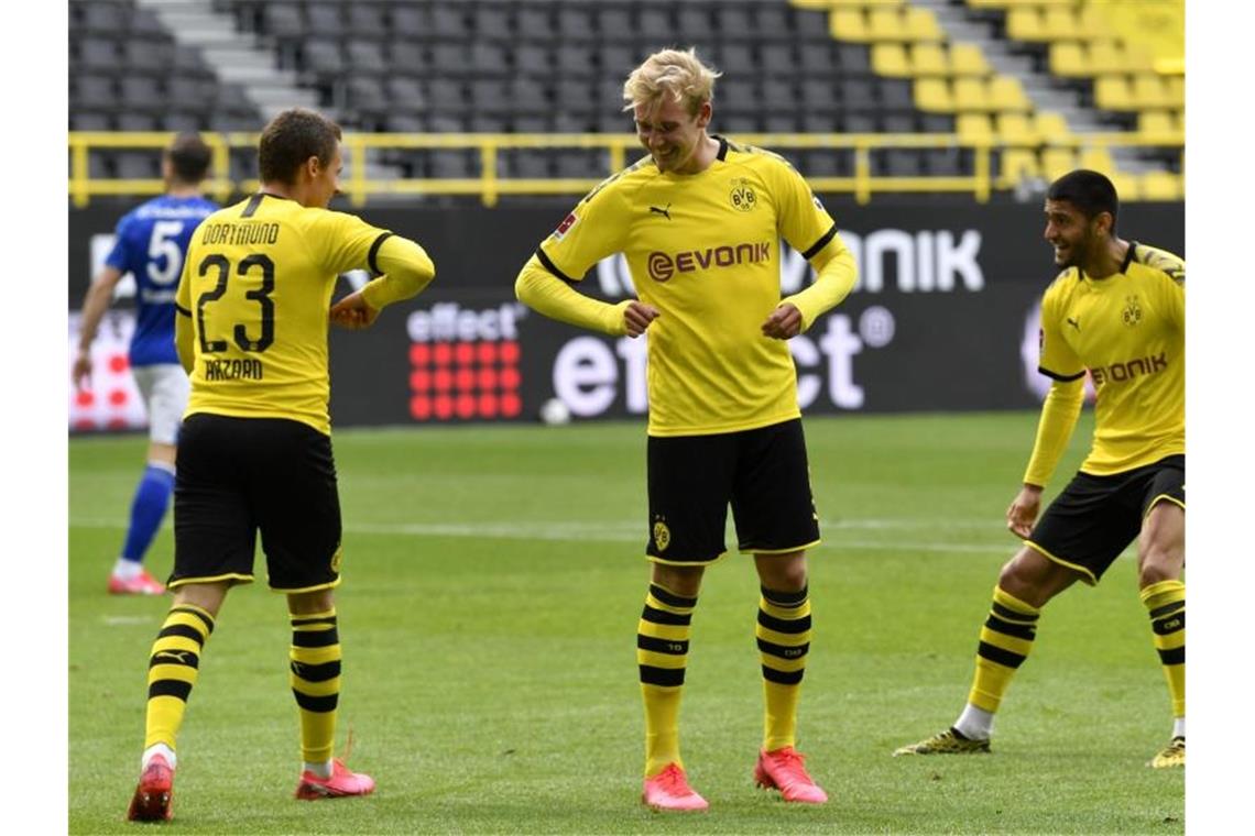 Die Dortmunder feierten einen klaren Derbysieg. Foto: Martin Meissner/AP-Pool/dpa